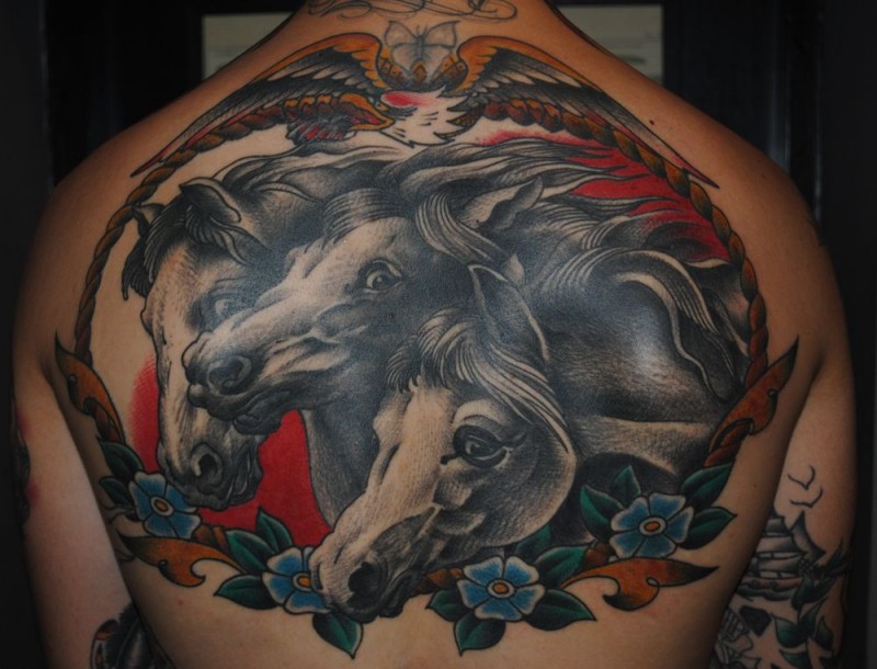 New school style colored back tattoo of running horses and flowers
