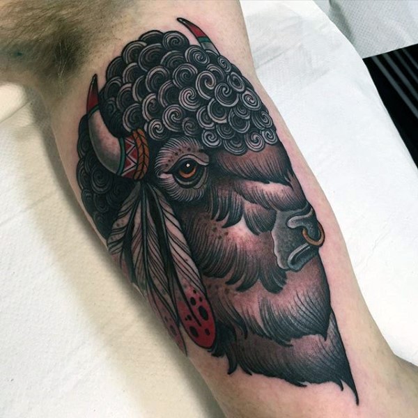 New school style colored biceps tattoo of Indian style bull