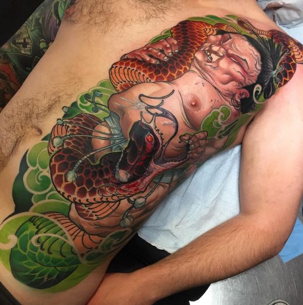 New school style colored chest and belly tattoo of Buddha with snake
