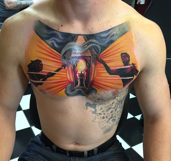 New school style colored chest tattoo of candle with humans