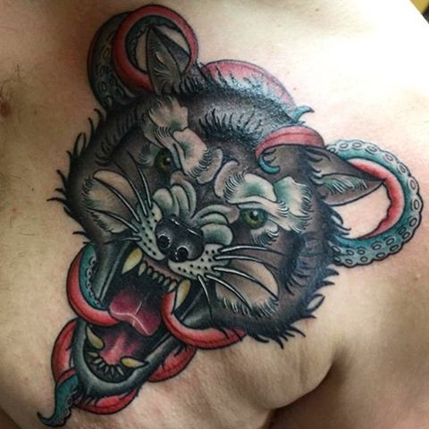 New school style colored chest tattoo of demonic do head