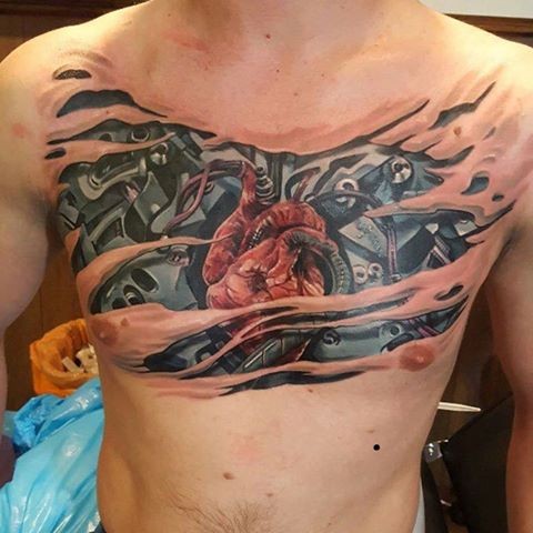 New school style colored chest tattoo of biomechanical heart
