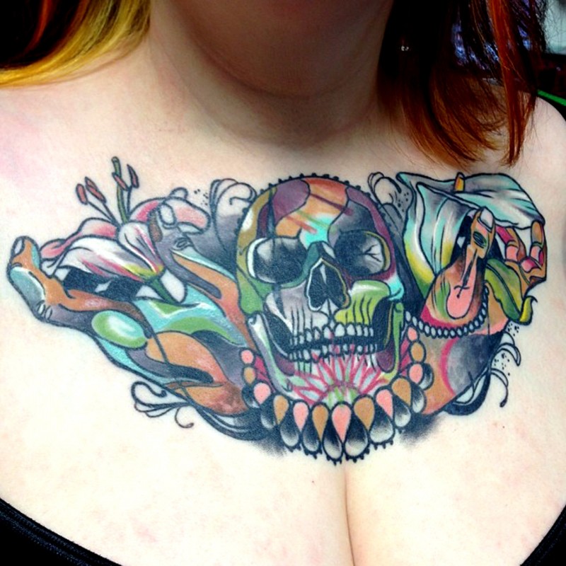 New school style colored chest tattoo of human skull and flowers