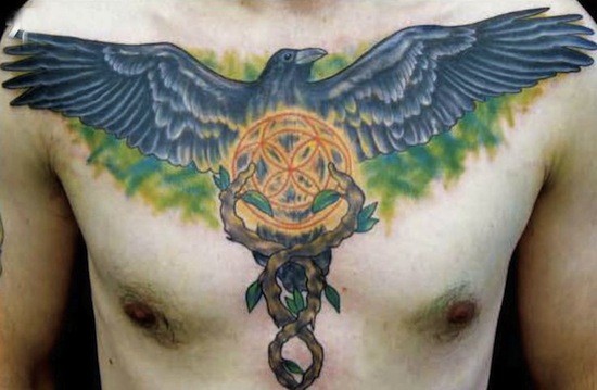 New school style colored chest tattoo of crow with rope and emblem