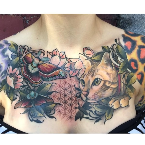 New school style colored collarbone tattoo of cat with butterflies and flowers