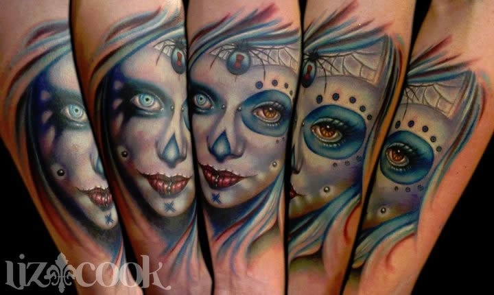 New school style colored creepy looking woman face tattoo on forearm