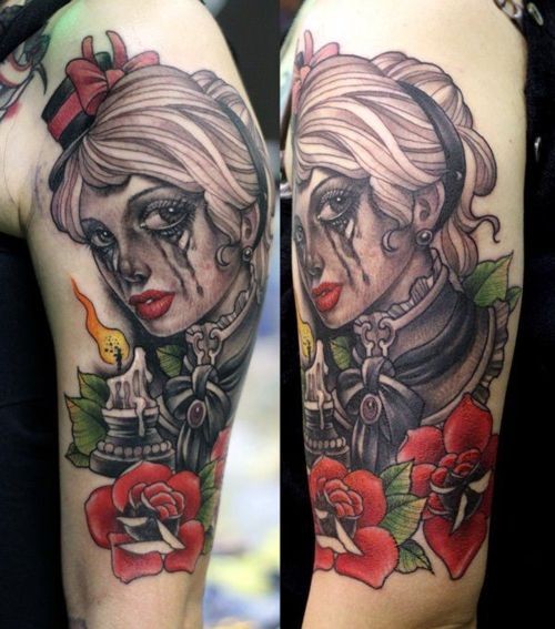 New school style colored crying woman portrait tattoo on shoulder with candle and rose flower