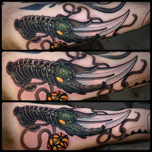 New school style colored fantasy dagger tattoo with rope