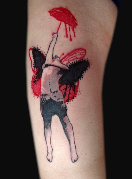 New school style colored forearm tattoo of man with wings and umbrella
