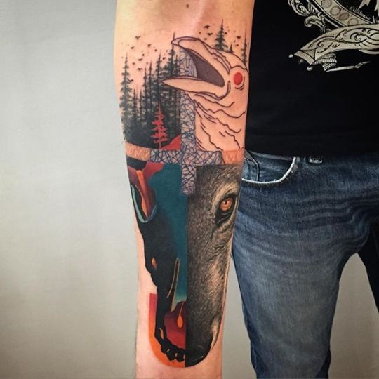 New school style colored forearm tattoo of various forest animals