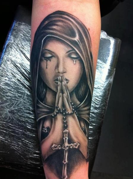 New school style colored forearm tattoo of mystical praying woman