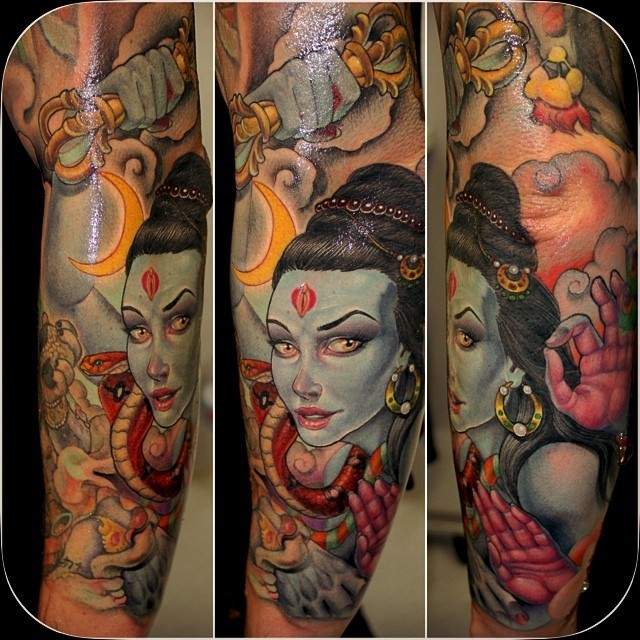 New school style colored forearm tattoo of Hinduism woman with snake