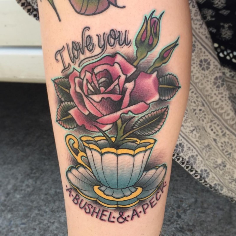 New school style colored leg tattoo of tea cup with rose and lettering
