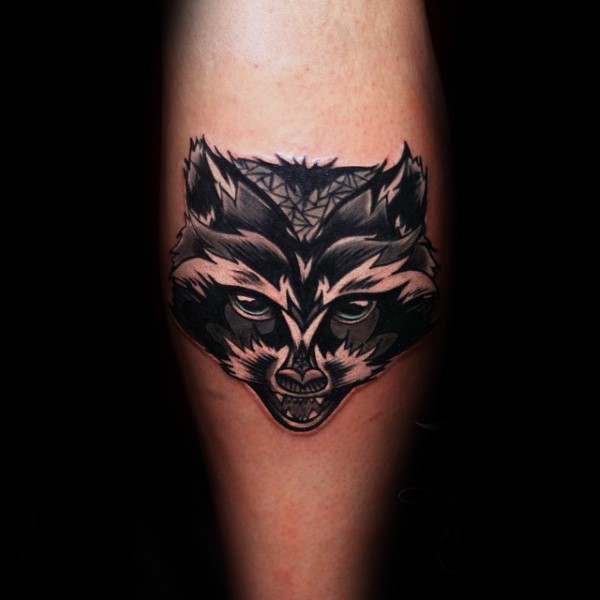 New school style colored leg tattoo of evil raccoon head