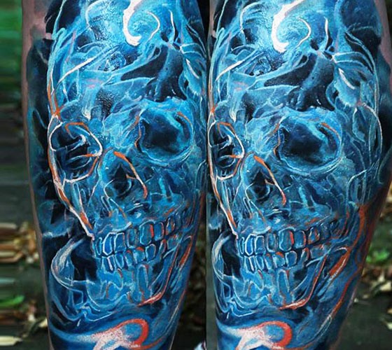 New school style colored leg tattoo of human skull