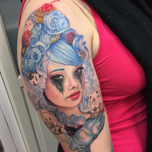 New school style colored shoulder tattoo of woman portrait with flowers