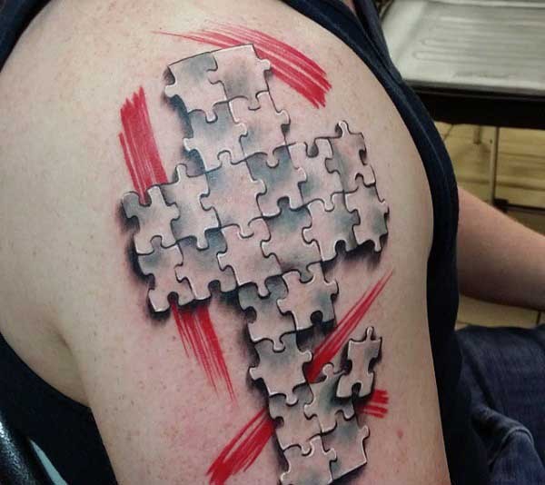 New  school style colored shoulder tattoo of puzzle cross and red lines