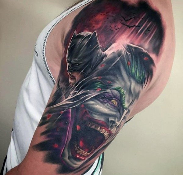 New school style colored shoulder tattoo of Batman with Joker