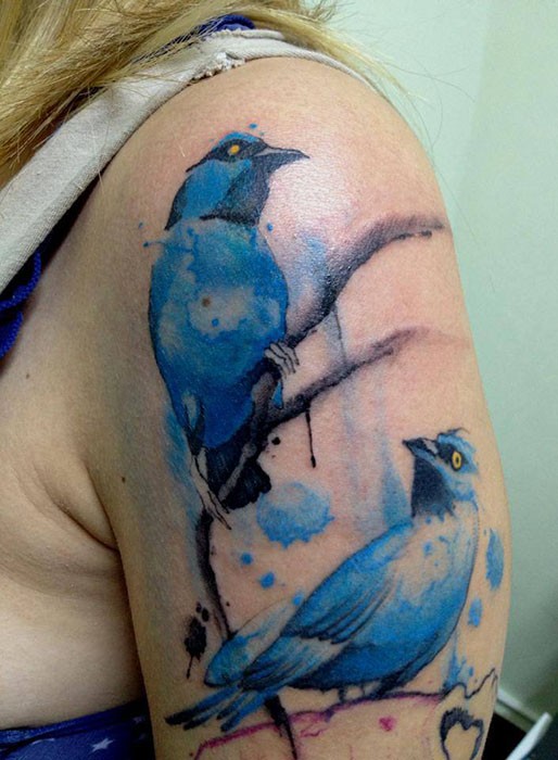 New school style colored shoulder tattoo of blue birds
