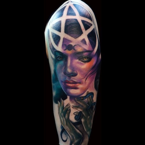 New school style colored shoulder tattoo of demonic woman with hands