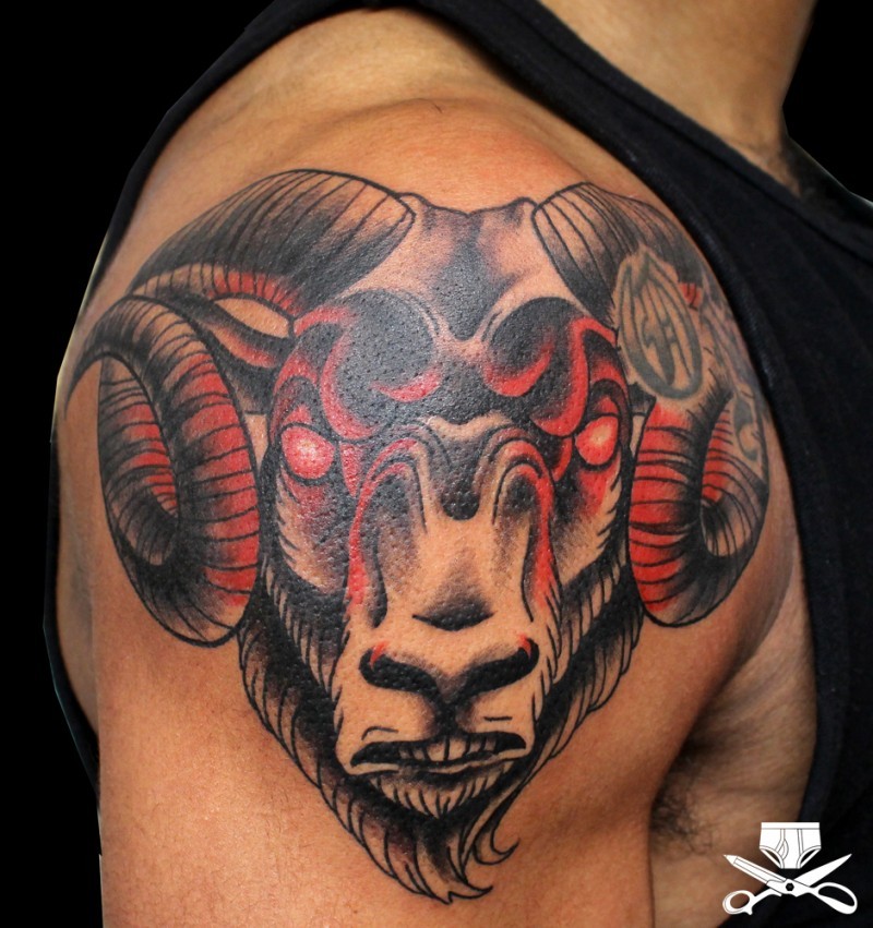 New school style colored shoulder tattoo of demonic goat head