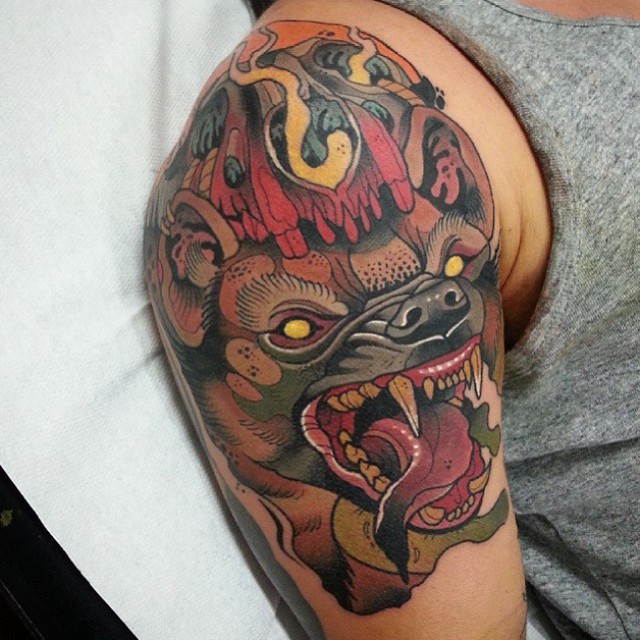 New school style colored shoulder tattoo of demonic bat face with smoke
