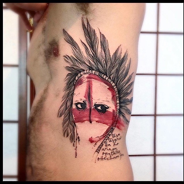 New school style colored side tattoo of tribal woman face with lettering