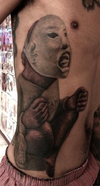 New school style colored side tattoo of creepy statue