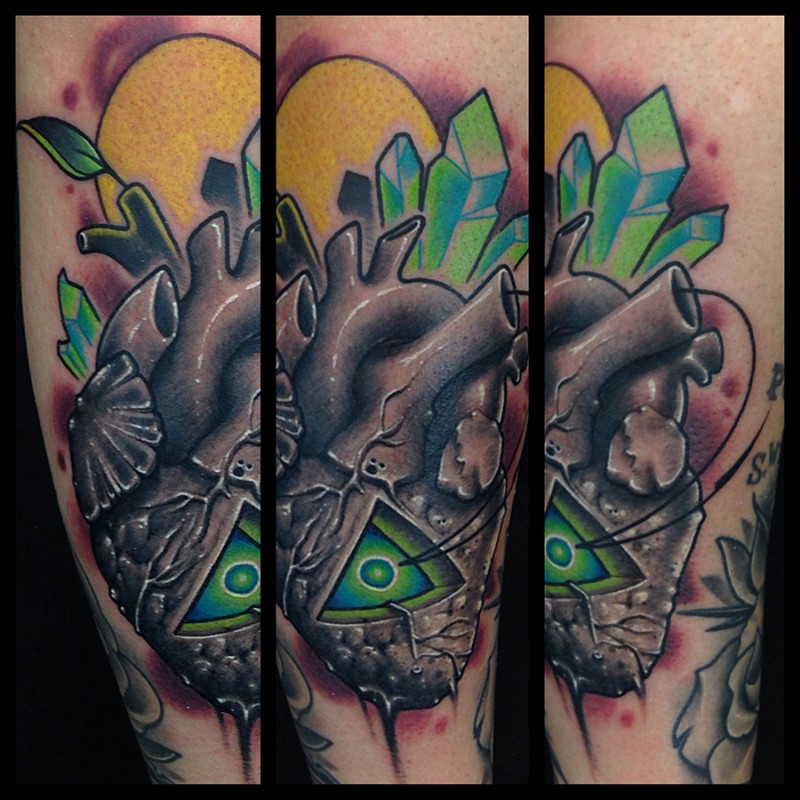 New school style colored tattoo of human heart stylized with triangle and crystals