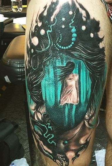 New school style colored thigh tattoo of woman in dark forest