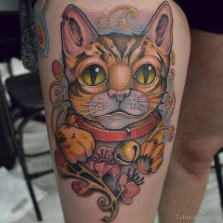 New school style colored thigh tattoo of awesome cat with flowers