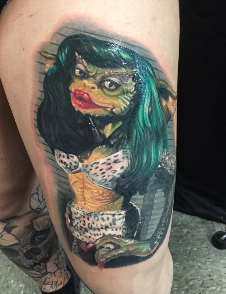 New school style colored thigh tattoo of lizard woman