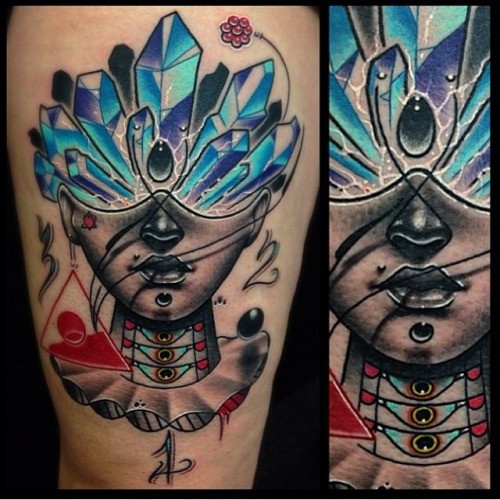 New school style colored thigh tattoo of human head with crystals