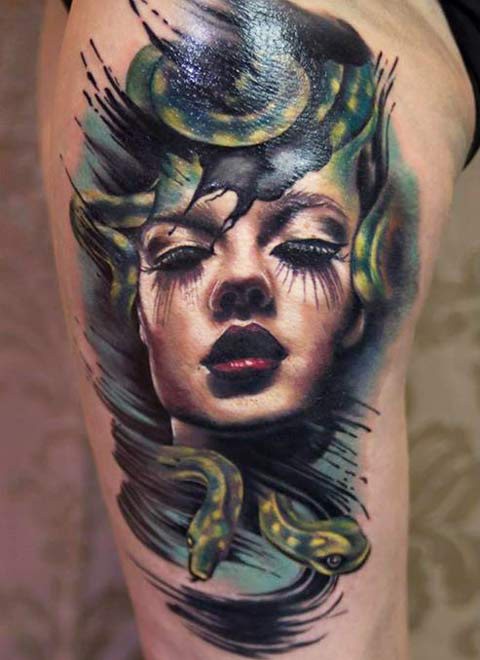 New school style colored thigh tattoo of Medusa portrait