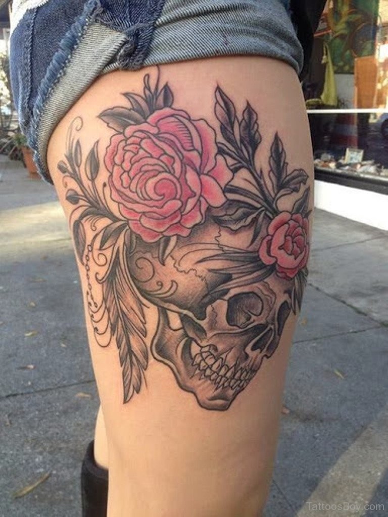 New school style colored thigh tattoo of red roses with human skull