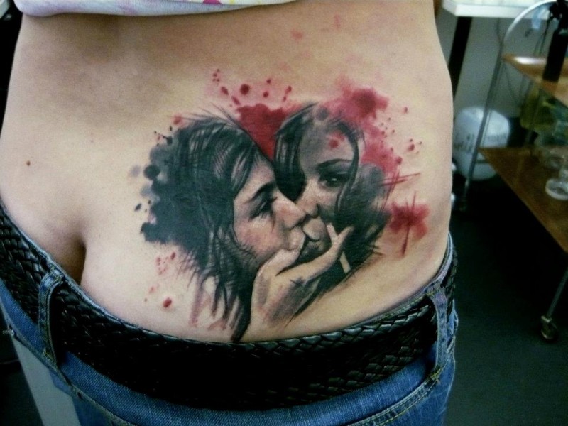 New school style colored thigh tattoo of kissing girls