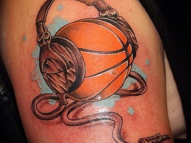 New school style colored thigh tattoo of basketball with headset