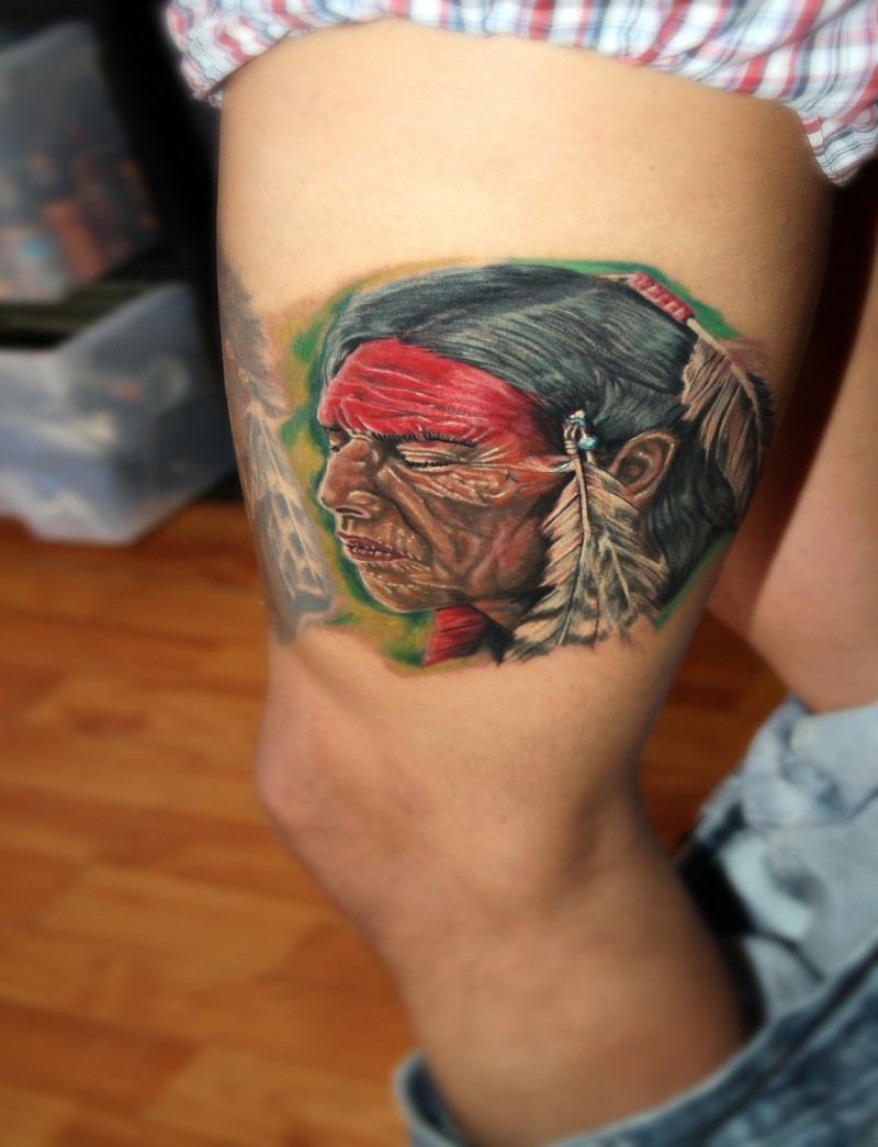 New school style colored thigh tattoo of old Indian
