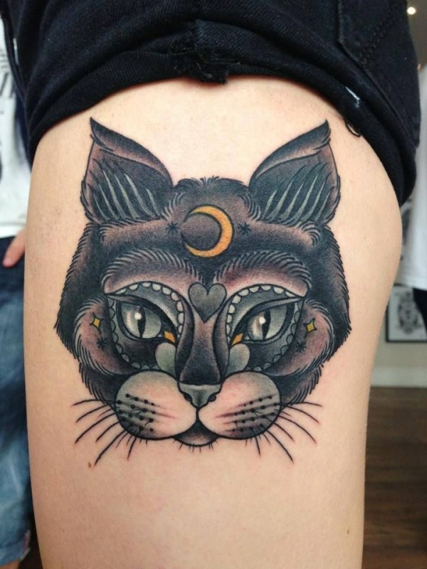 New school style colored thigh tattoo of cool cat stylized with moon symbol