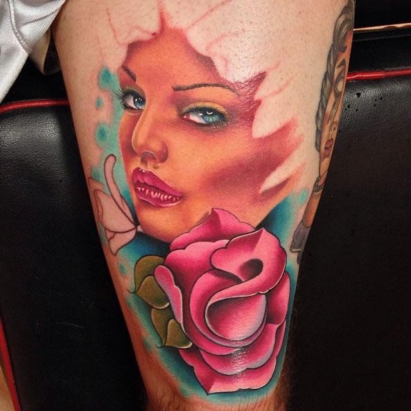 New school style colored thigh tattoo of fantasy woman with rose