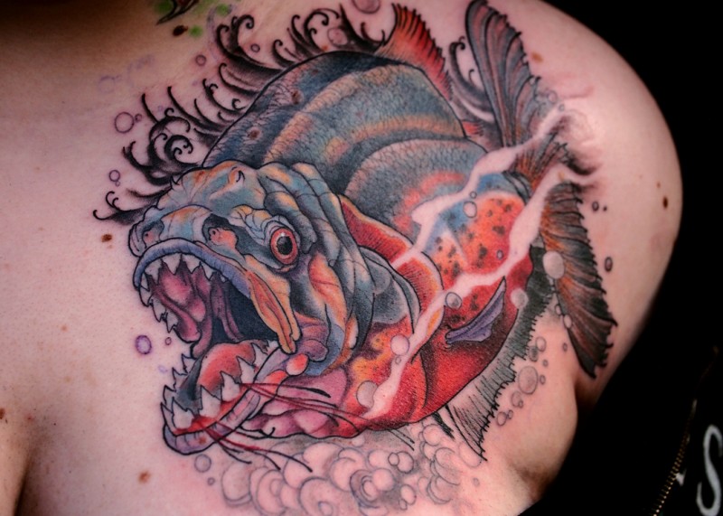 New school style colored upper back tattoo of evil violent fish