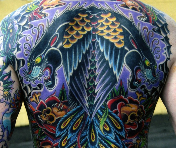 New school style colored whole back tattoo of mirrored black panthers with skulls and feather