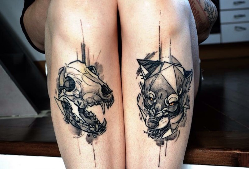 New school style half colored tattoo of animal skull and wolf head