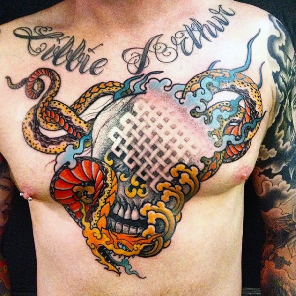 New school style interesting designed chest tattoo of human skull stylized with dragon