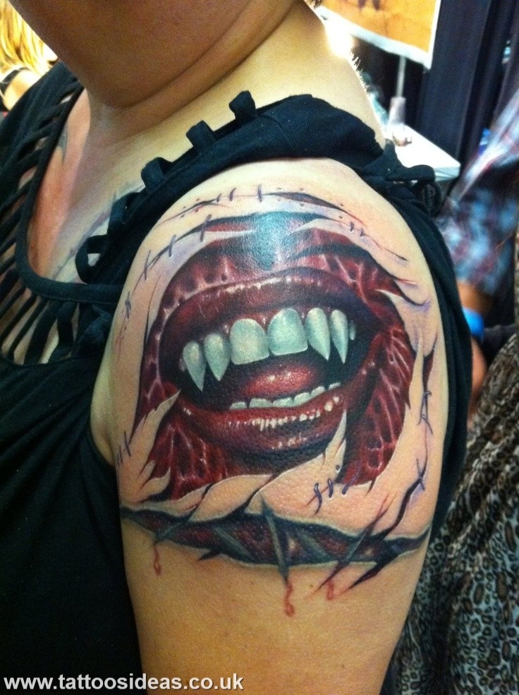 New school style shoulder tattoo of vampire woman mouth
