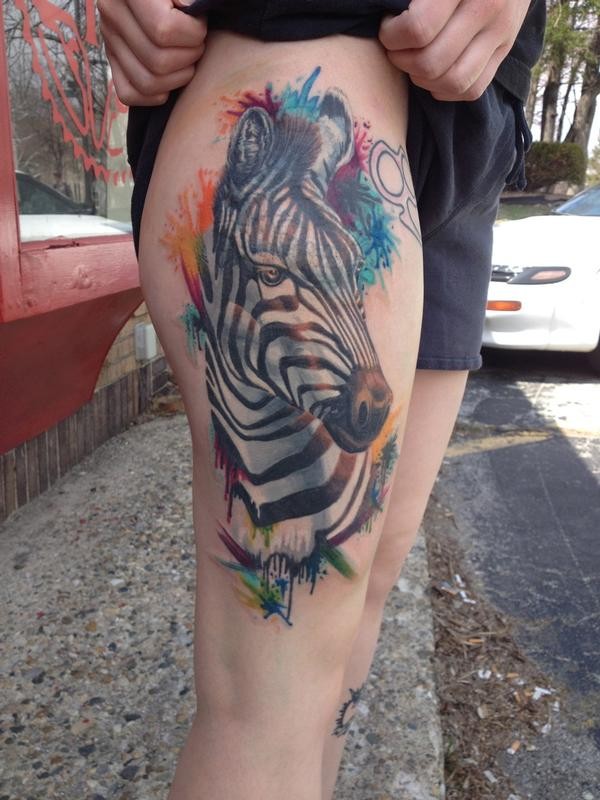 New style coloured zebra tattoo on hip by Asia Rain