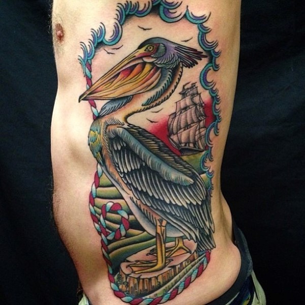 Nice big colorful bird with ship tattoo on side