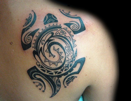 Nice black ink polynesian turtle tattoo on shoulder blade