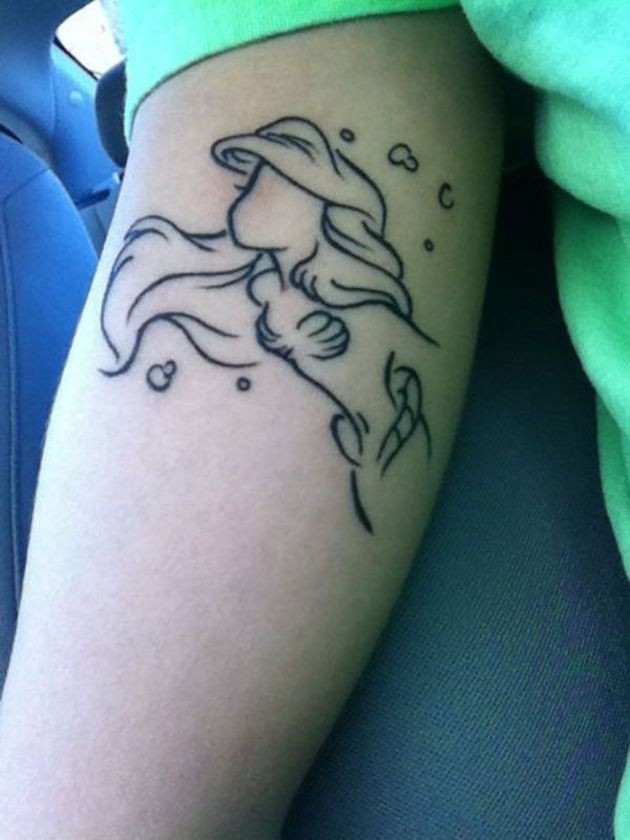 Nice cartoon Ariel mermaid black ink contour tattoo on forearm