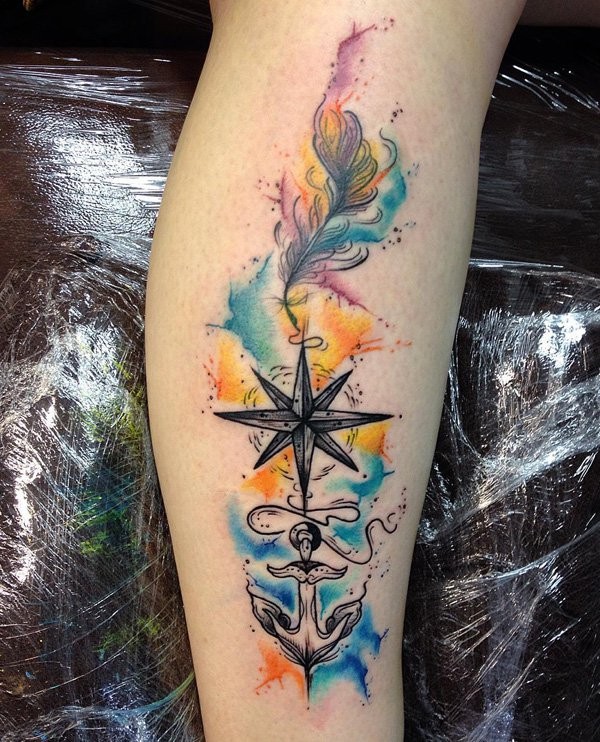 Nice colored big tattoo on leg with star, anchor and feather